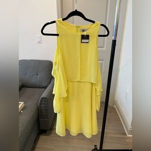 Pretty yellow boutique dress with the perfect sleeves